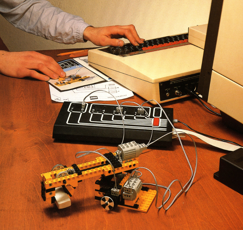 A LEGO Interface A control box connected to a BBC micro model B with a LEGO Technic robot arm being controlled by the computer.